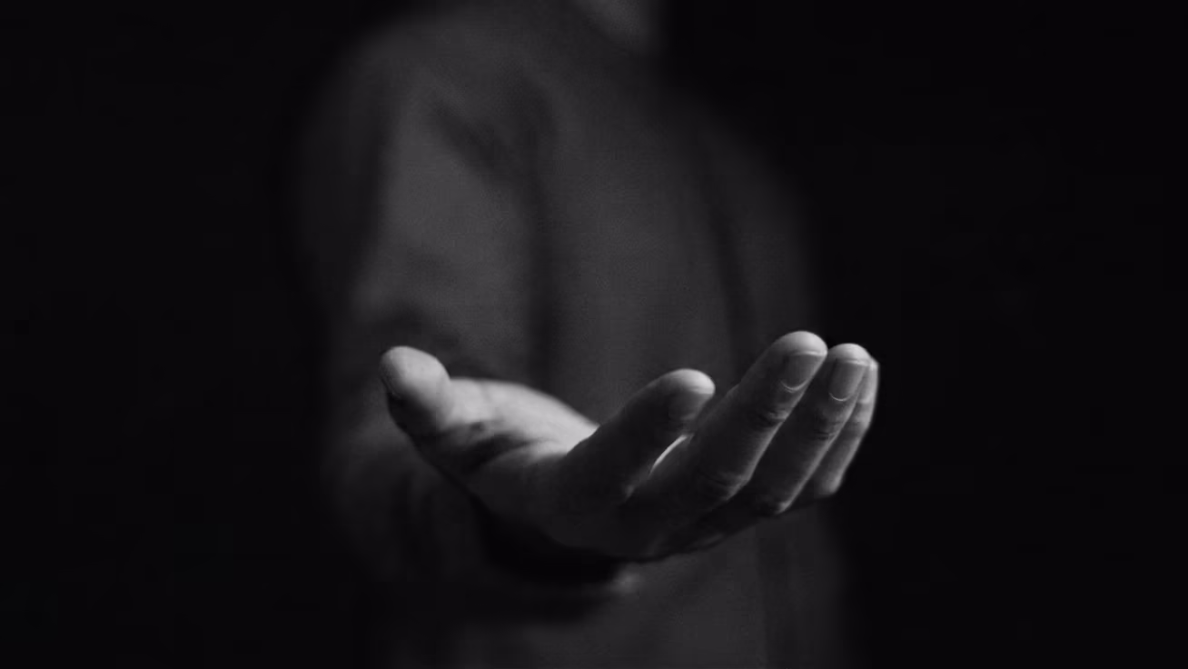 An open hand, palm up